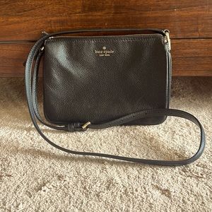 Kate Spade black small crossbody. L-9.5” H-7” W-2”. Max strap drop 23.”